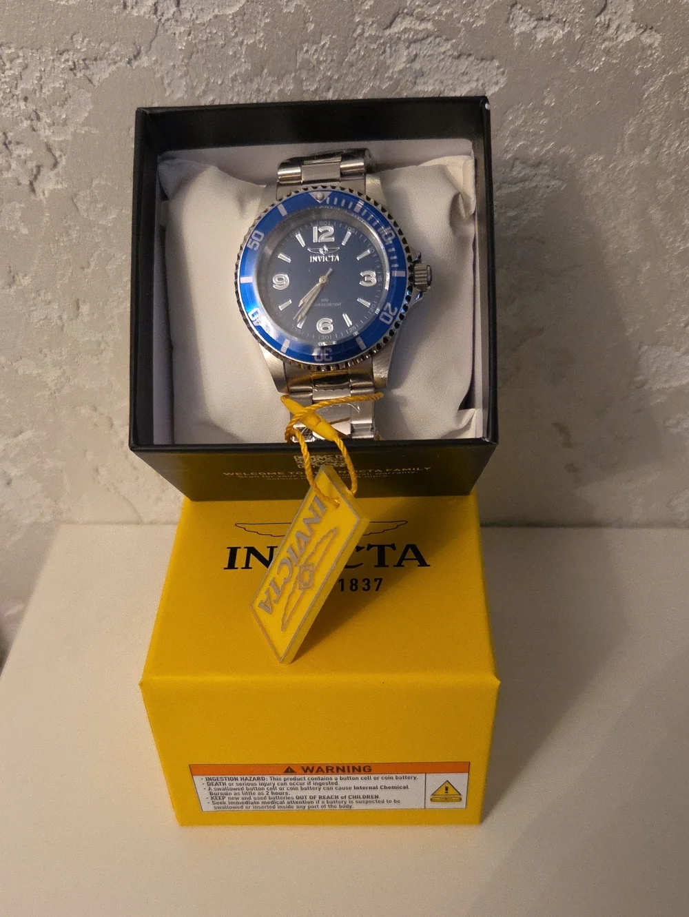 Invicta Men’s Silver Watch with Blue Dial and Bezel